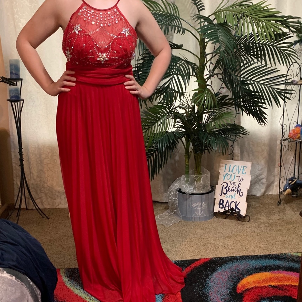 Long red prom dress.